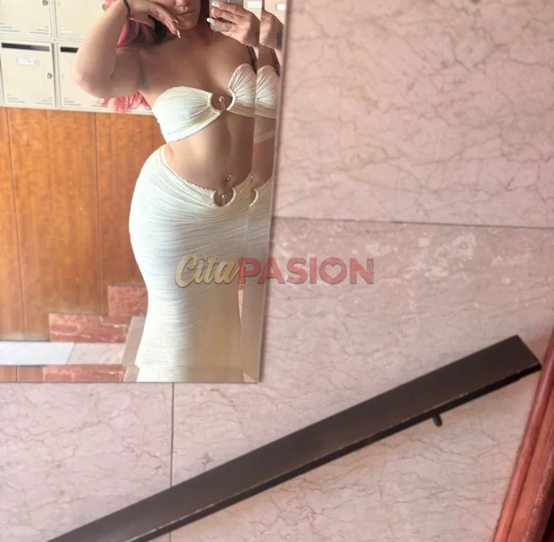 Escort en Madrid capital. Jovencita bi pelirroja y tatuada.